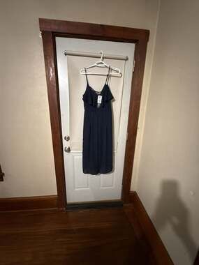 Navy Polka Dot Ruffle Jumpsuit. New with tags.